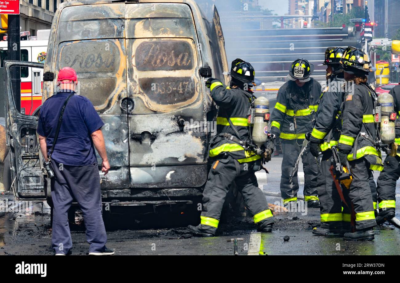 New York, NY, United States. 16th September, 2023. Members of the New York City Fire Department (FDNY) are seen in action to take control of the car fire on Madison Avenue and 61st Street in New York City. Credit: Ryan Rahman/Alamy Live News Stock Photo