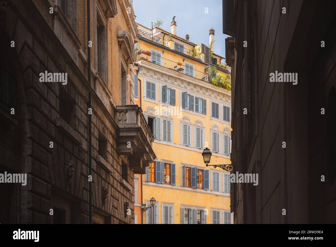 Traditional and colourful residential buildings and architecture in Rione VI Parione in central old town of historic Rome, Italy. Stock Photo