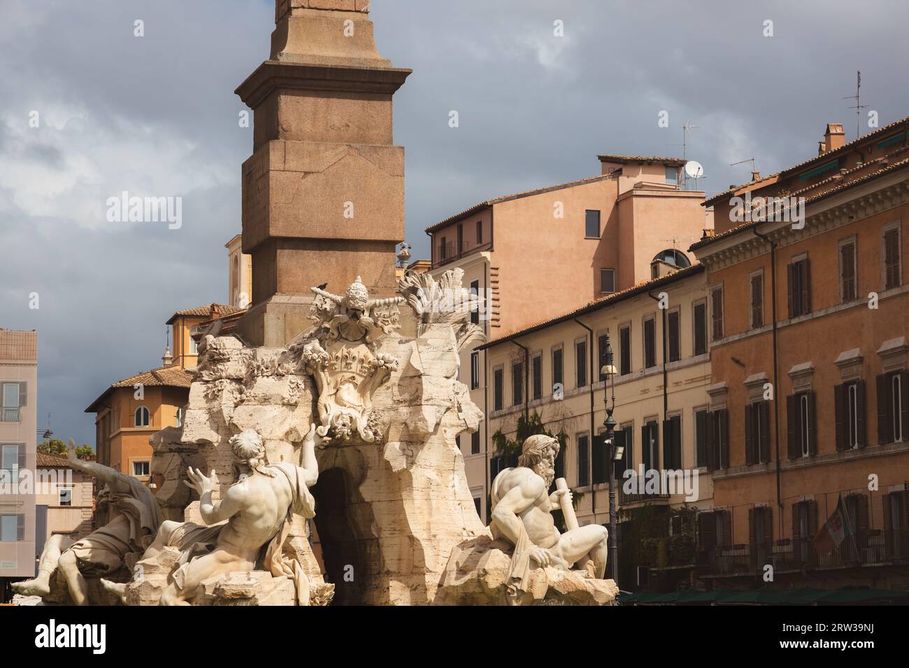 Close-up detail of Bernini's sculpted Baroque Fountain of the Four Rivers in Piazza Navona, a popular tourist landmark in the historic old town of Rom Stock Photo