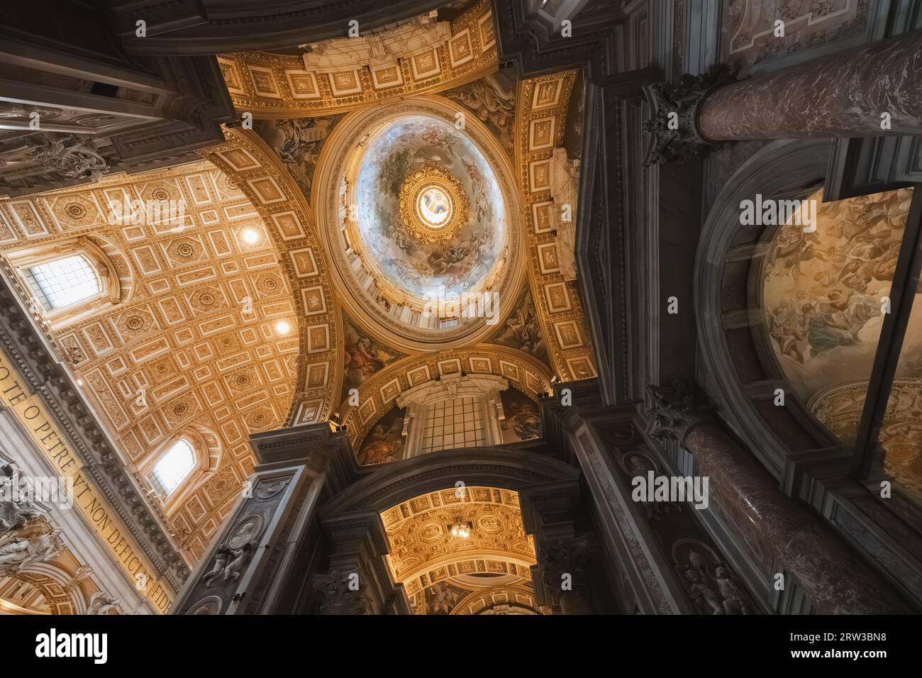 Extravagant interior of Saint Peter's Basilica, home of the Roman Catholic Church in Vatican City, Rome, Italy. Stock Photo