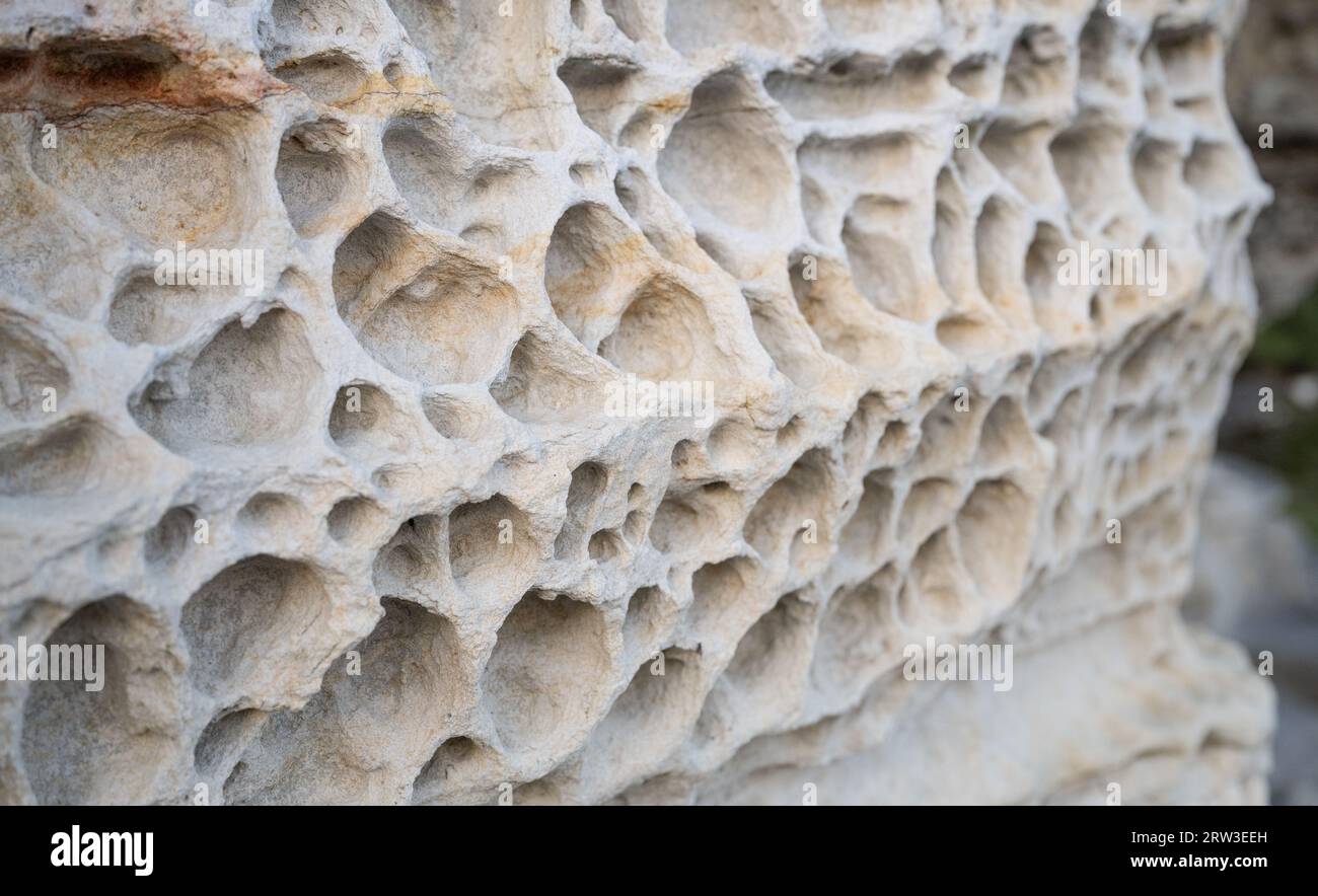 Elgol Beach Isle of Skye Scotland.  Honeycomb Rock.  The weathering is caused by erosion from the sea and salt. Stock Photo