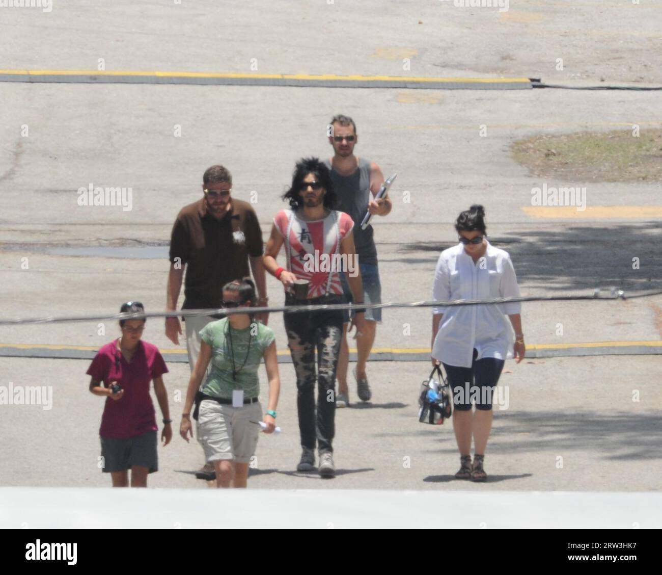 MIAMI, , FL - JUNE 01: Alec Baldwin and Russell Brand Rock Out on the Rock of Ages Set on June 01, 2011 in Miami,  Florida.    People:   Russell Brand Stock Photo