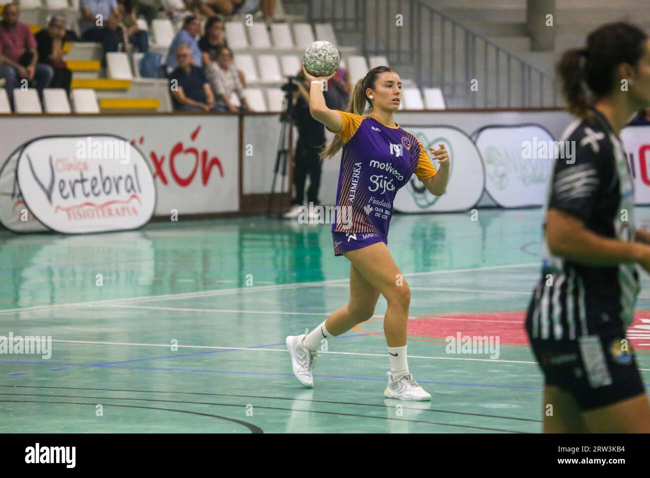 Gijon, Spain, 16th September, 2023: The player of Motive.co Gijon Balonmano La Calzada, Marta da Silva (19) with the ball during the 3rd Matchday of the Liga Guerrreras Iberdrola 2023-24 between Motive.co Gijon Balonmano La Calzada and the Costa del Sol Malaga, on September 26, 2023, at the Arena Pavilion, in Gijón, Spain. Credit: Alberto Brevers / Alamy Live News. Stock Photo