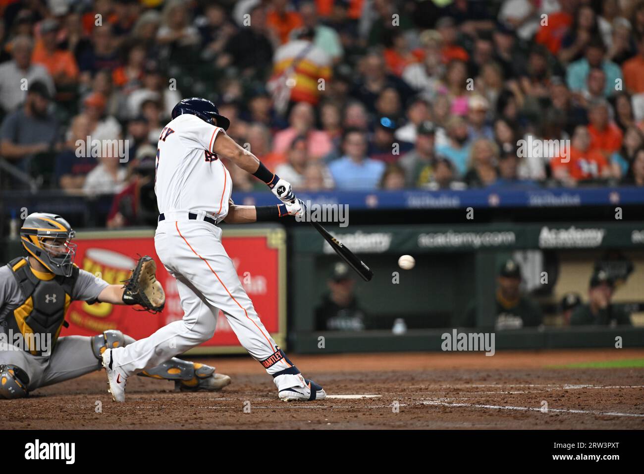 Houston Astros designated hitter Michael Brantley (23) singles to center in the bottom of the fifth inning of Houston Astros designated hitter Michael Stock Photo