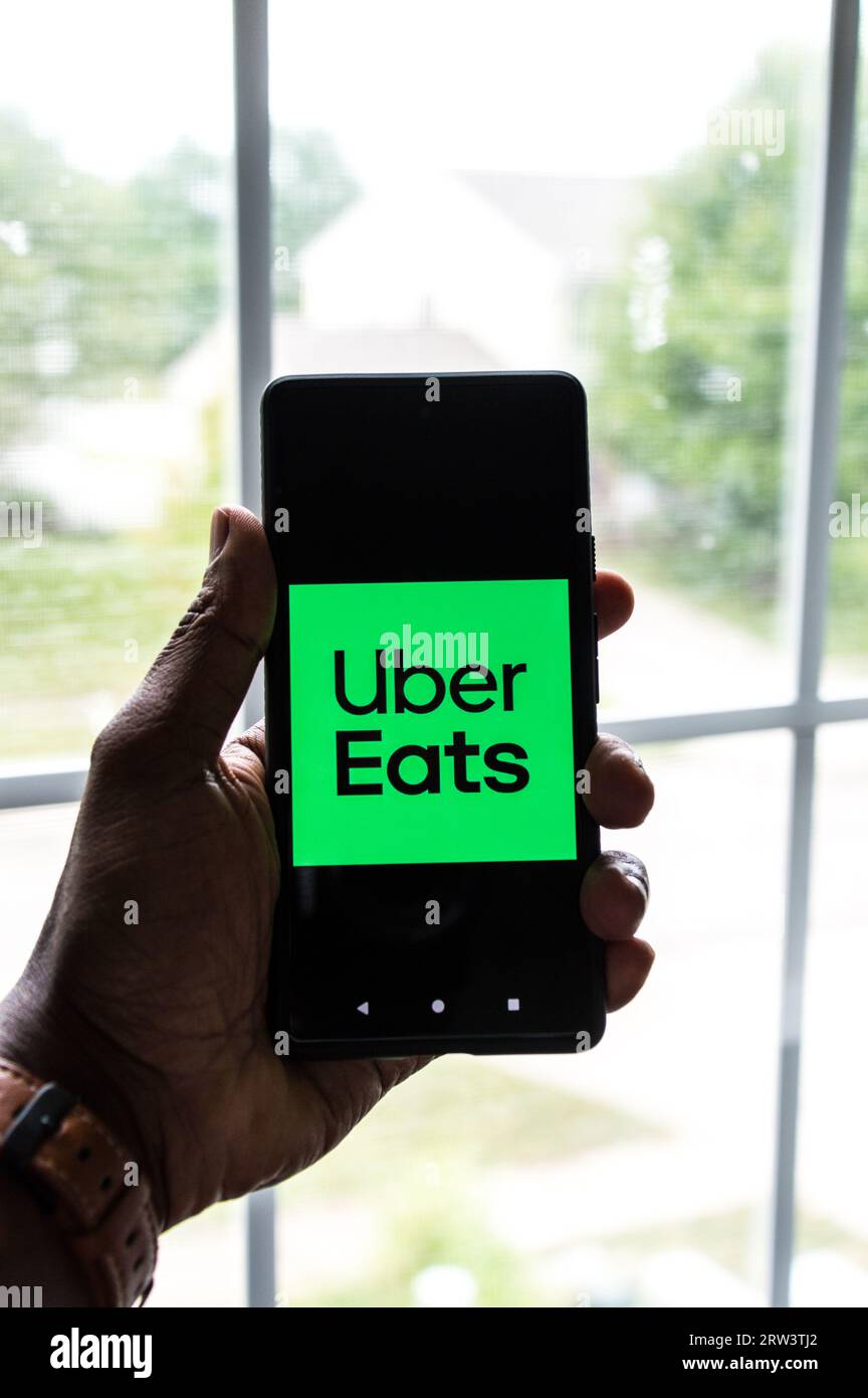 Uber Eats logo on phone Stock Photo