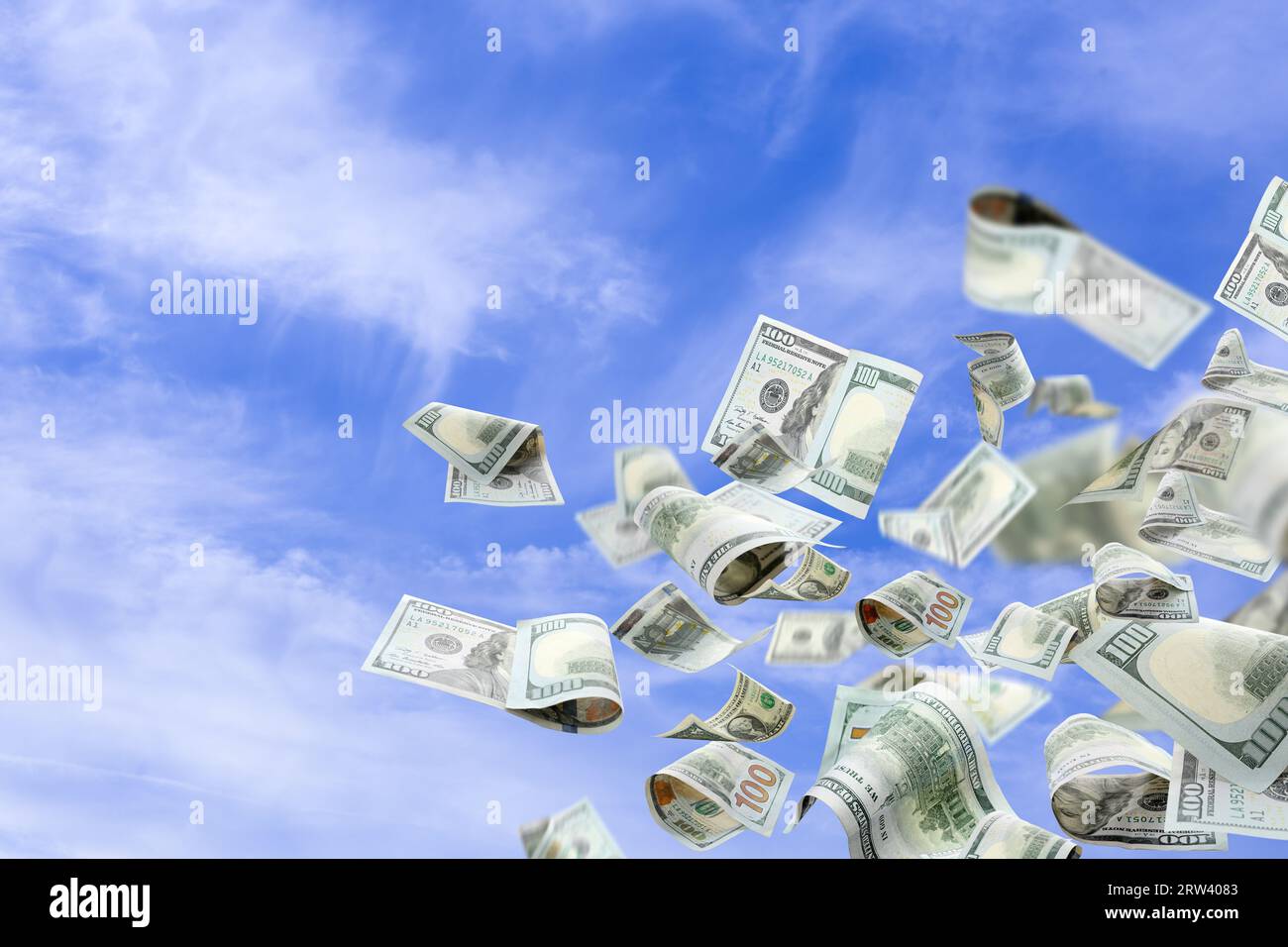 Plenty of money falling from sky Stock Photo Alamy