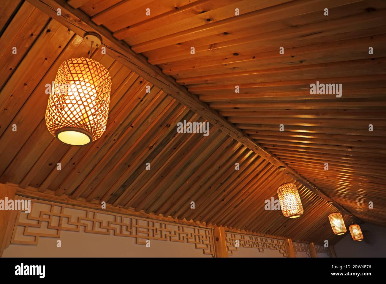 Traditional Chinese lanterns hang on the roof Stock Photo - Alamy