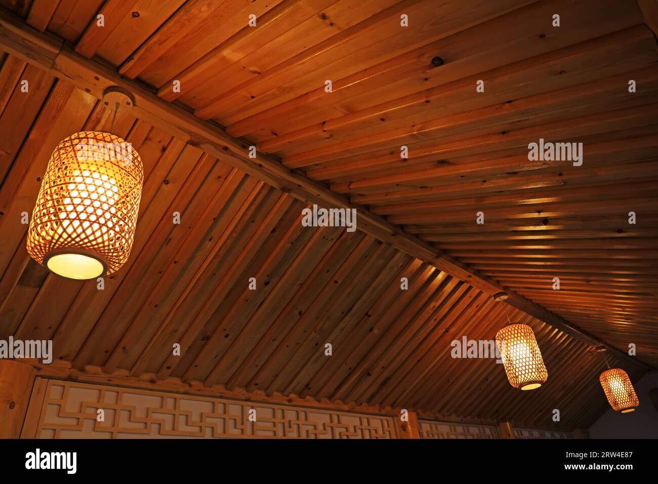 Traditional Chinese lanterns hang on the roof Stock Photo - Alamy