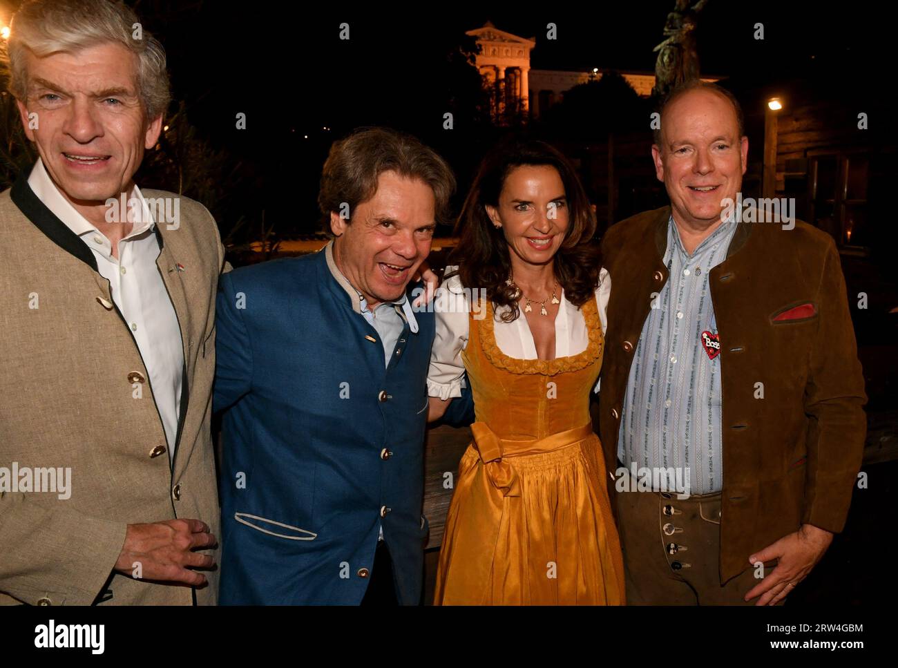 Munich, Germany. 16th Sep, 2023. Prince Albert II of Monaco (r) celebrates with the landlord couple of the Käfer tent Michael Käfer (2nd from left) and Clarissa Käfer (3rd from left) and Alexander Liegl (l), Honorary Consul of Monaco, in the Käfer tent. The 188th Wiesn will take place this year from 16.09.- 03.10.2023. Credit: Felix Hörhager/dpa/Alamy Live News Stock Photo