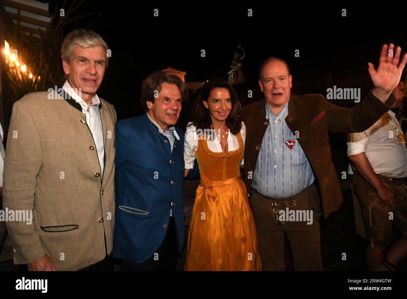 Munich, Germany. 16th Sep, 2023. Prince Albert II of Monaco (r) celebrates with the landlord couple of the Käfer tent Michael Käfer (2nd from left) and Clarissa Käfer (3rd from left) and Alexander Liegl (l), Honorary Consul of Monaco, in the Käfer tent. The 188th Wiesn will take place this year from 16.09.- 03.10.2023. Credit: Felix Hörhager/dpa/Alamy Live News Stock Photo