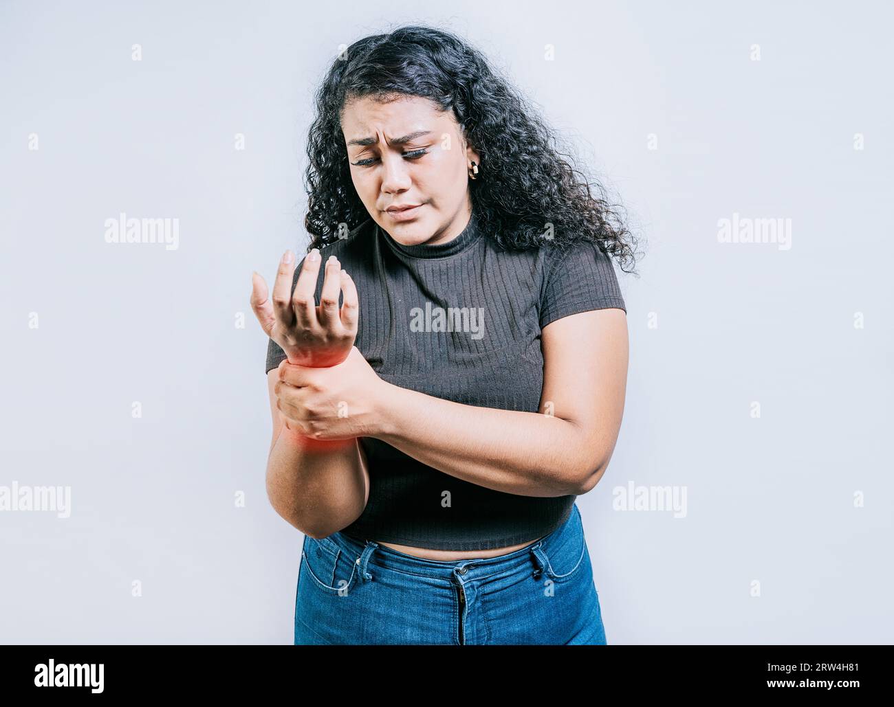People with wrist pain and arthritis isolated. Young woman with arthritis isolated.. Wrist pain and arthritis concept Stock Photo