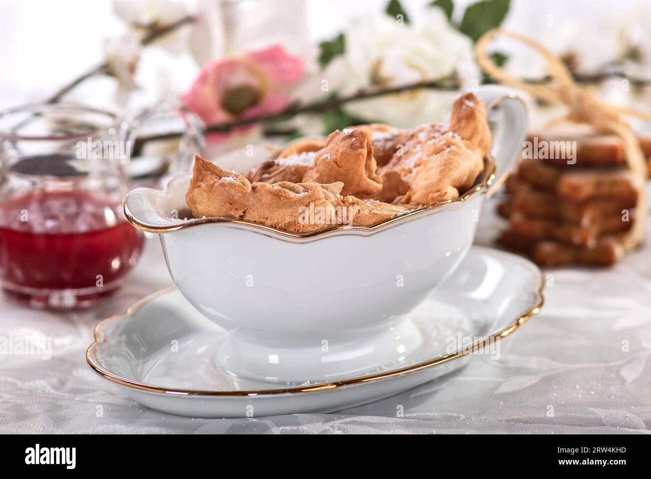 Salzburger Nockerln baked in a sauce boat, sprinkled with icing sugar ...