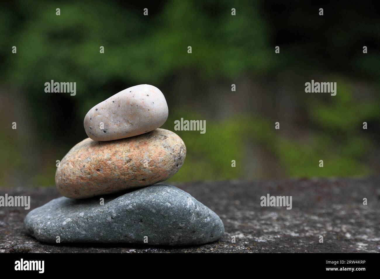 Stone man in nature, taken with depth of field Stock Photo