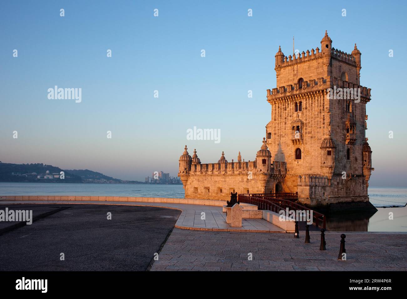 Belem Tower and promenade along the Tagus river at sunrise in Lisbon, Portugal Stock Photo