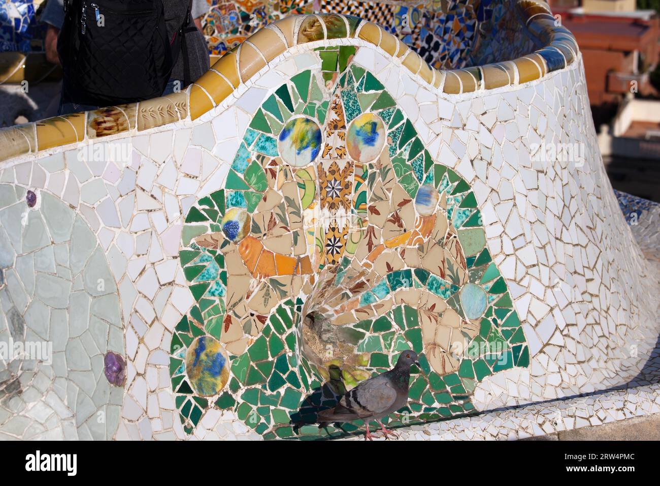 Trencadis broken tile shards abstract mosaic, part of Serpentine Bench at Gaudi's Park Guell in Barcelona, Catalonia, Spain Stock Photo