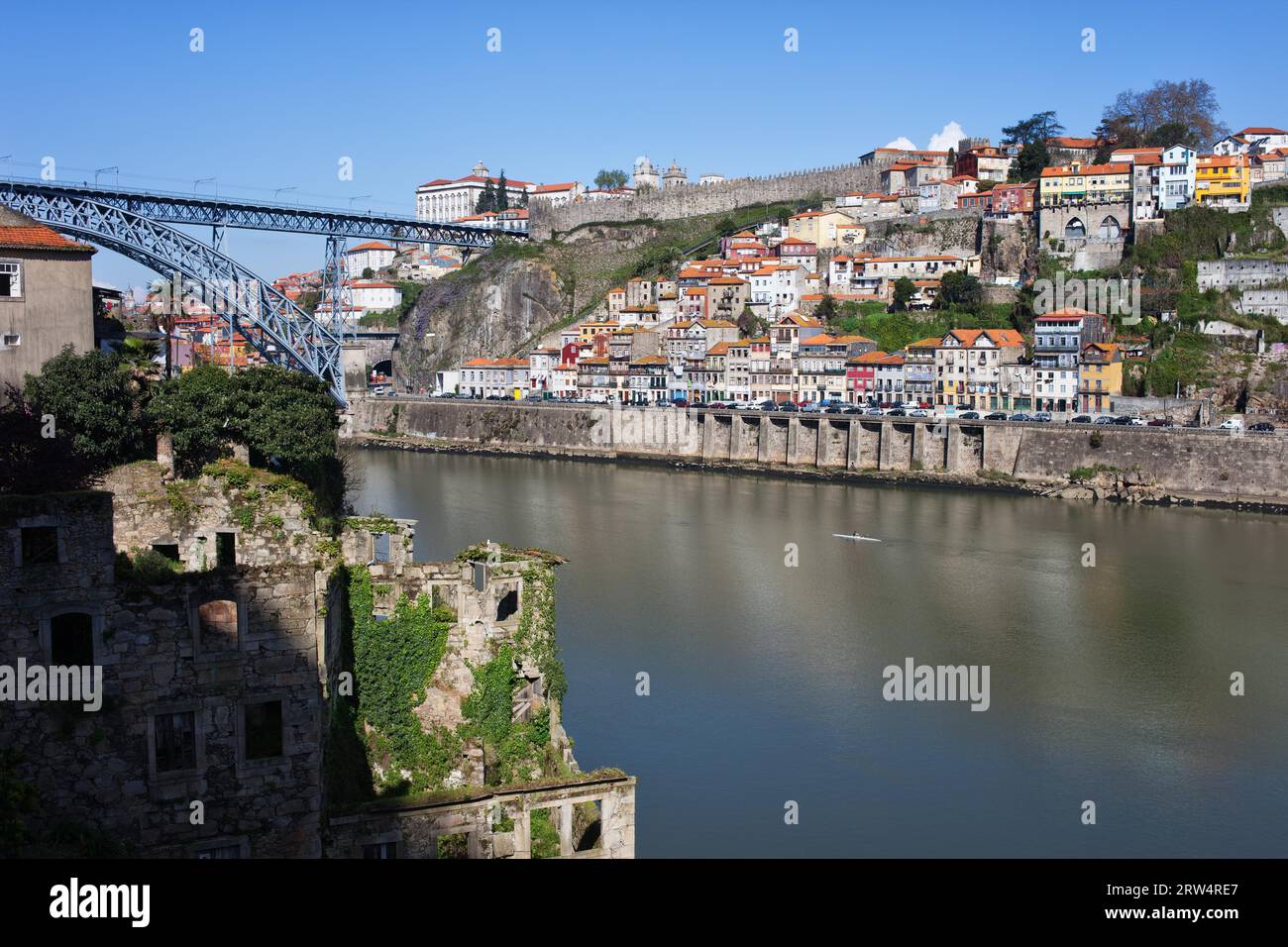 Cities of Porto and Gaia in Portugal, old town skyline, building ruins by the Douro river in