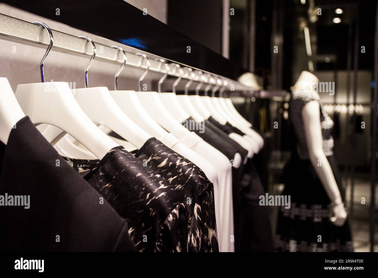 Clothes hang on a shelf in a designer clothes store in Melbourne