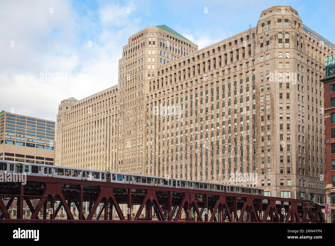 The Merchandise Mart and a train on a clear winter's morning in Chicago, USA Stock Photo