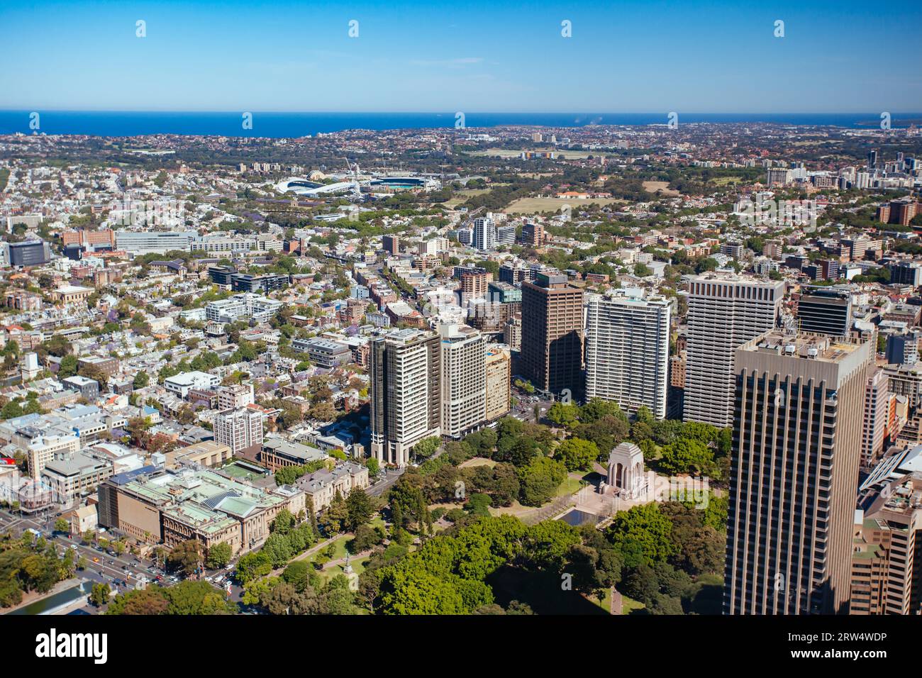 An aerial view of Hyde Park, Darlinghurst, Paddington and Allianz Stadium on a clear sunny day