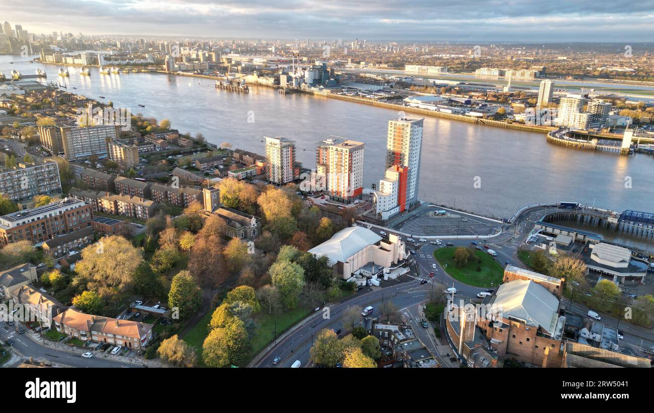 Aerial view of a cityscape featuring a bustling harbor, residential ...
