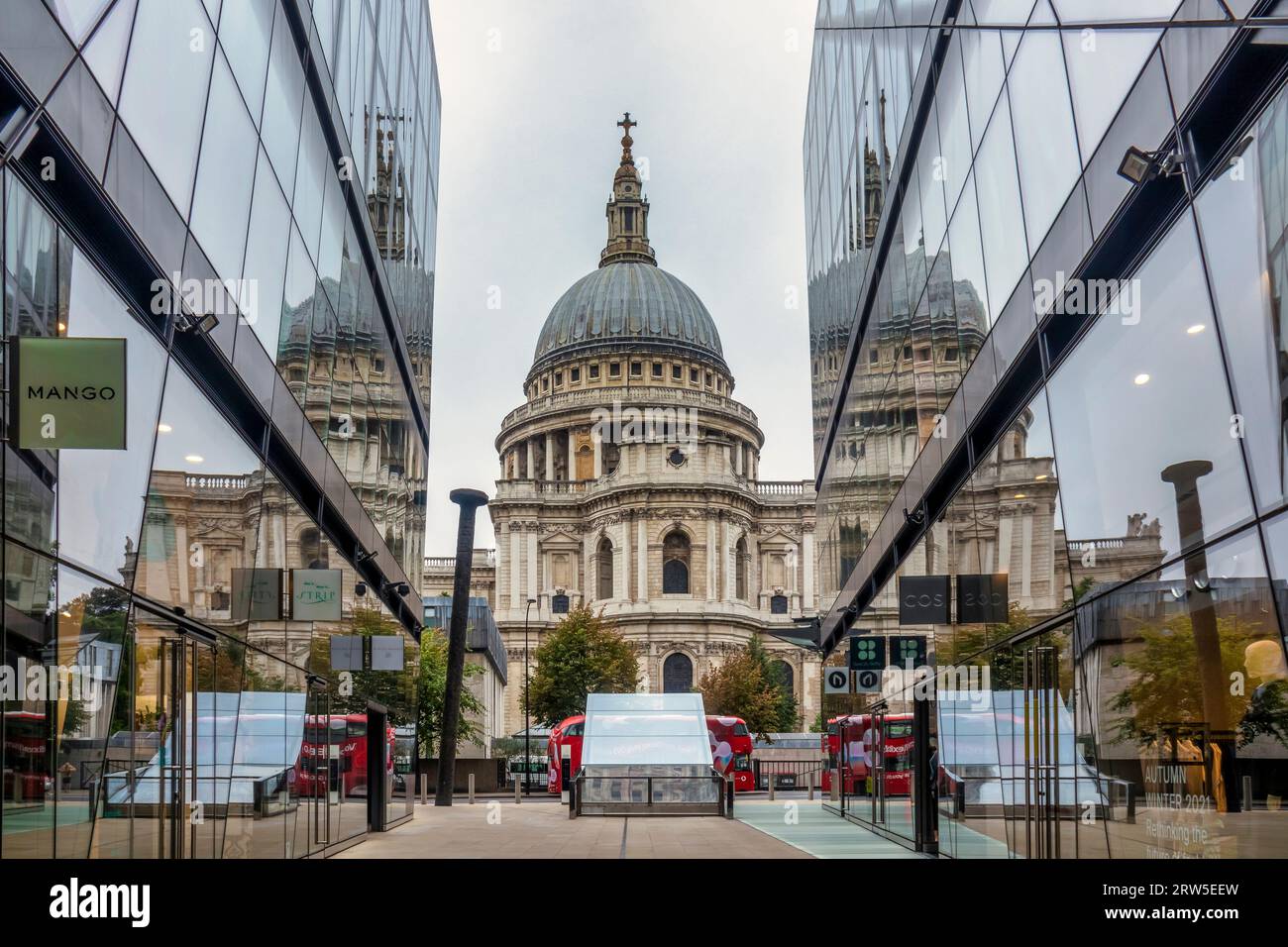 St Pauls Cathedral and its reflection from glass walls of One New Change building in London Stock Photo