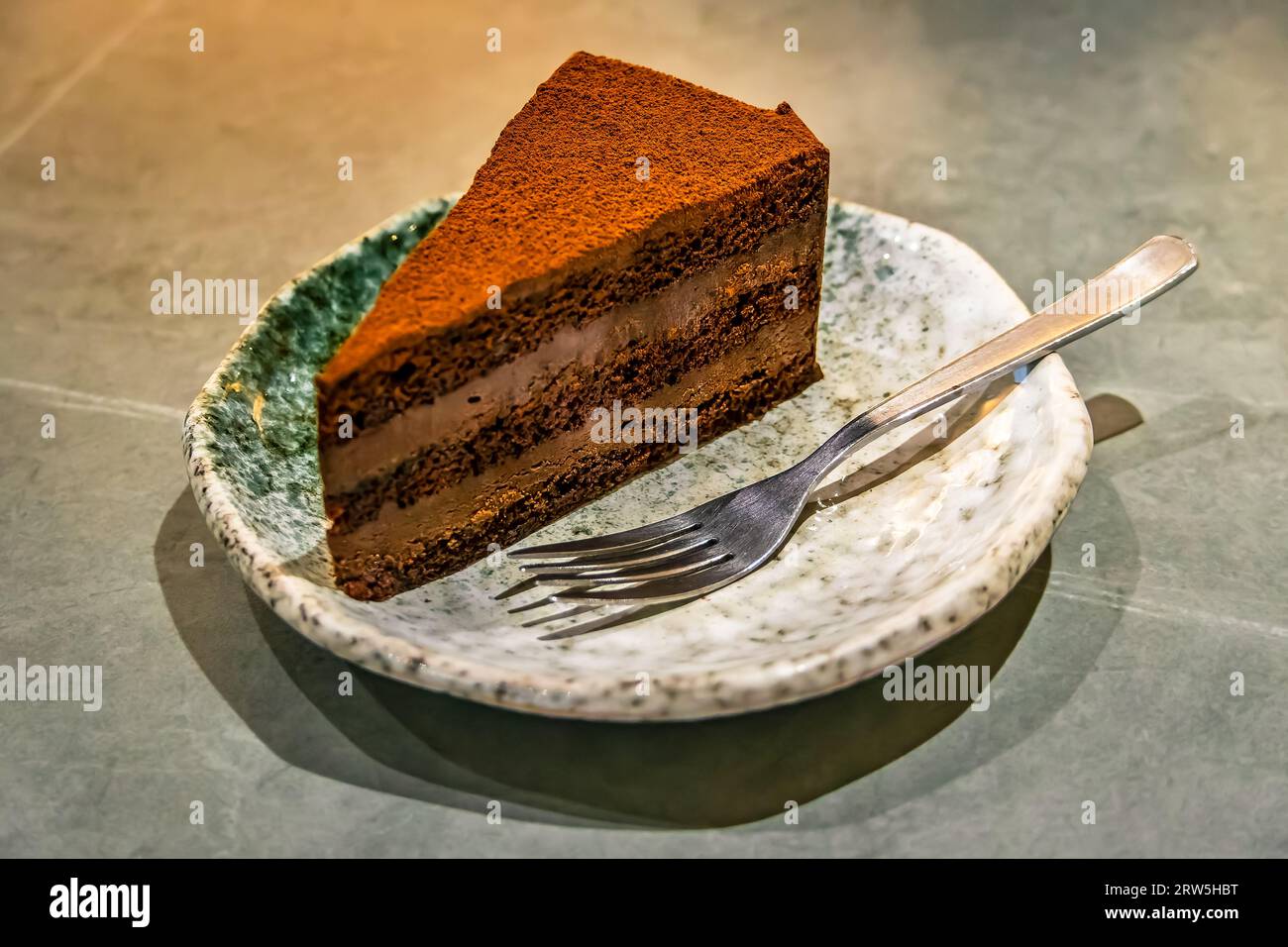 chocolate truffle cake coated in cocoa powder Stock Photo