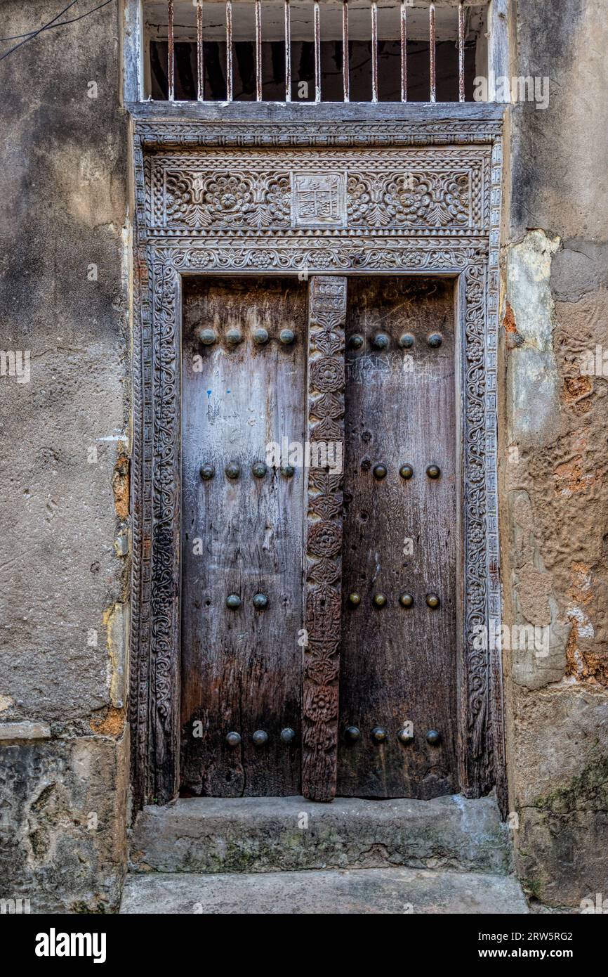 Carved wooden doors of stone town Stock Photo - Alamy