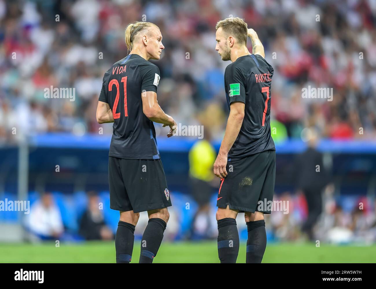 Sochi, Russia – July 7, 2018. Croatia national football team defender Domagoj Vida and midfielder Ivan Rakitic during World Cup 2018 quarter-final Rus Stock Photo