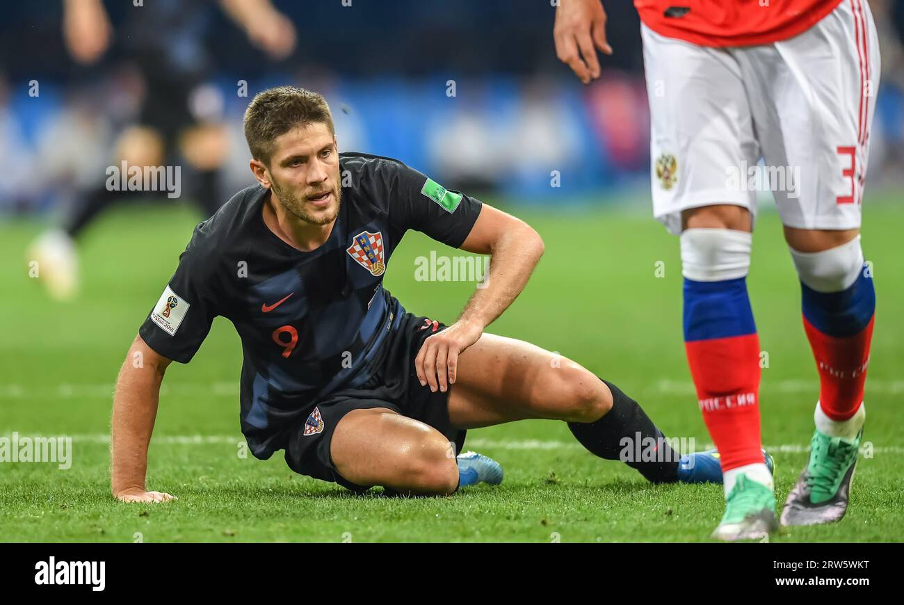 Sochi, Russia – July 7, 2018. Croatia national football team midfielder Andrej Kramaric on the pitch after being committed a foul upon during World Cu Stock Photo