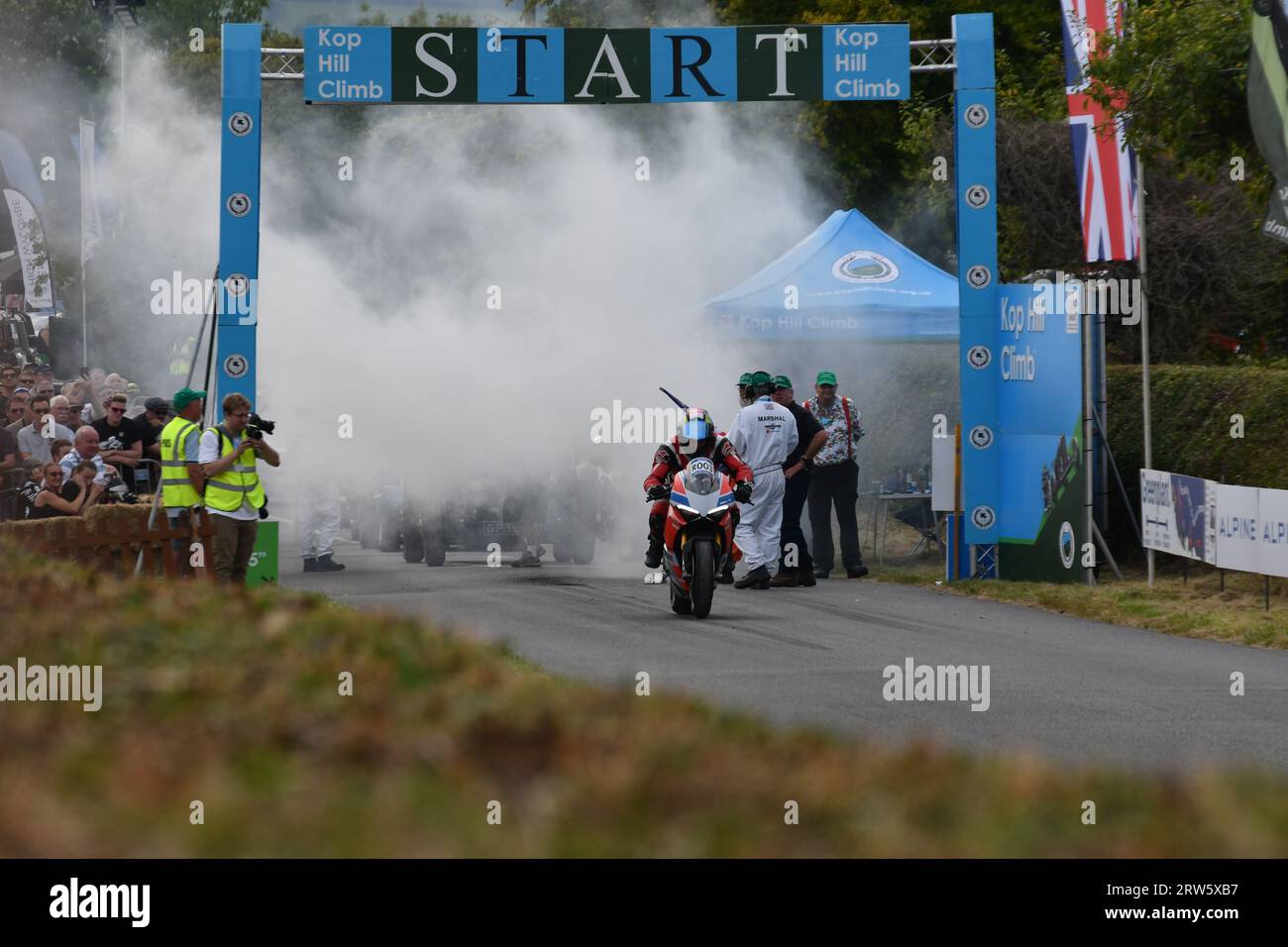 Motorbike, smoke. Kop Hill Climb 2023. Classic motorsport event in Princes Risborough