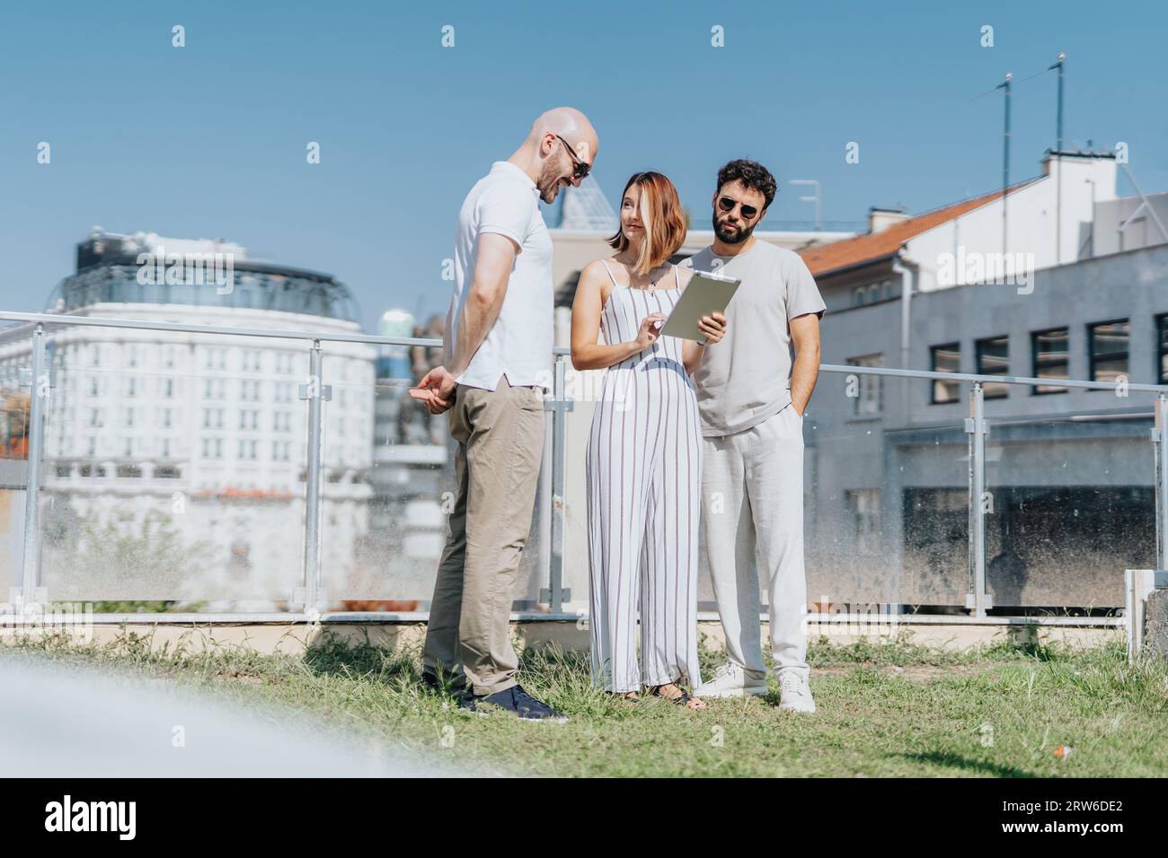 Successful Urban Architecture Team Collaborating on Construction Project Stock Photo