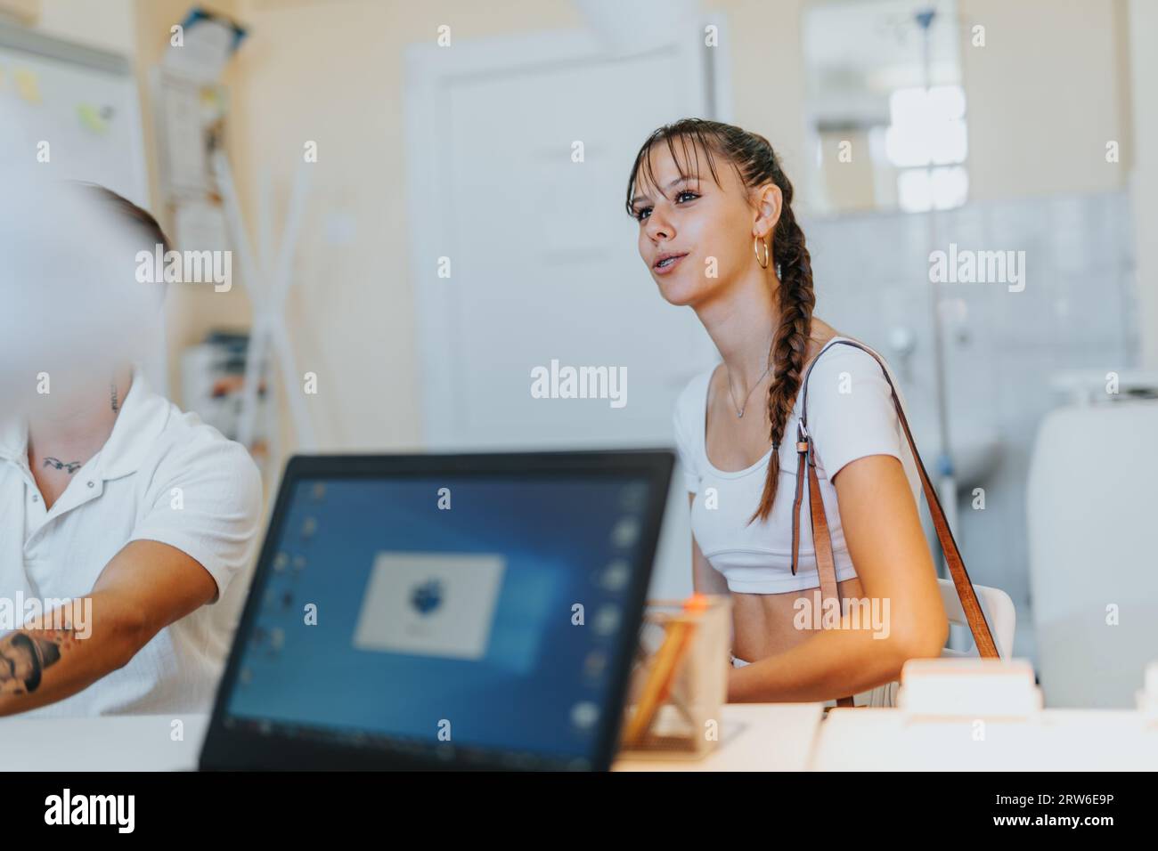 Doctor advising couple hi-res stock photography and images - Alamy