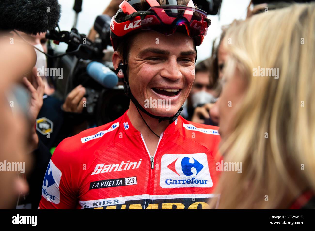 Sepp Kuss (Jumbo-Visma), red jersey and winner of the Vuelta Espa–a 2023, in front of his wife Noemi Ferre at the end of the stage 20 of the Spanish bicycle race La Vuelta on September 16, 2023 in Guadarrama, Spain Stock Photo