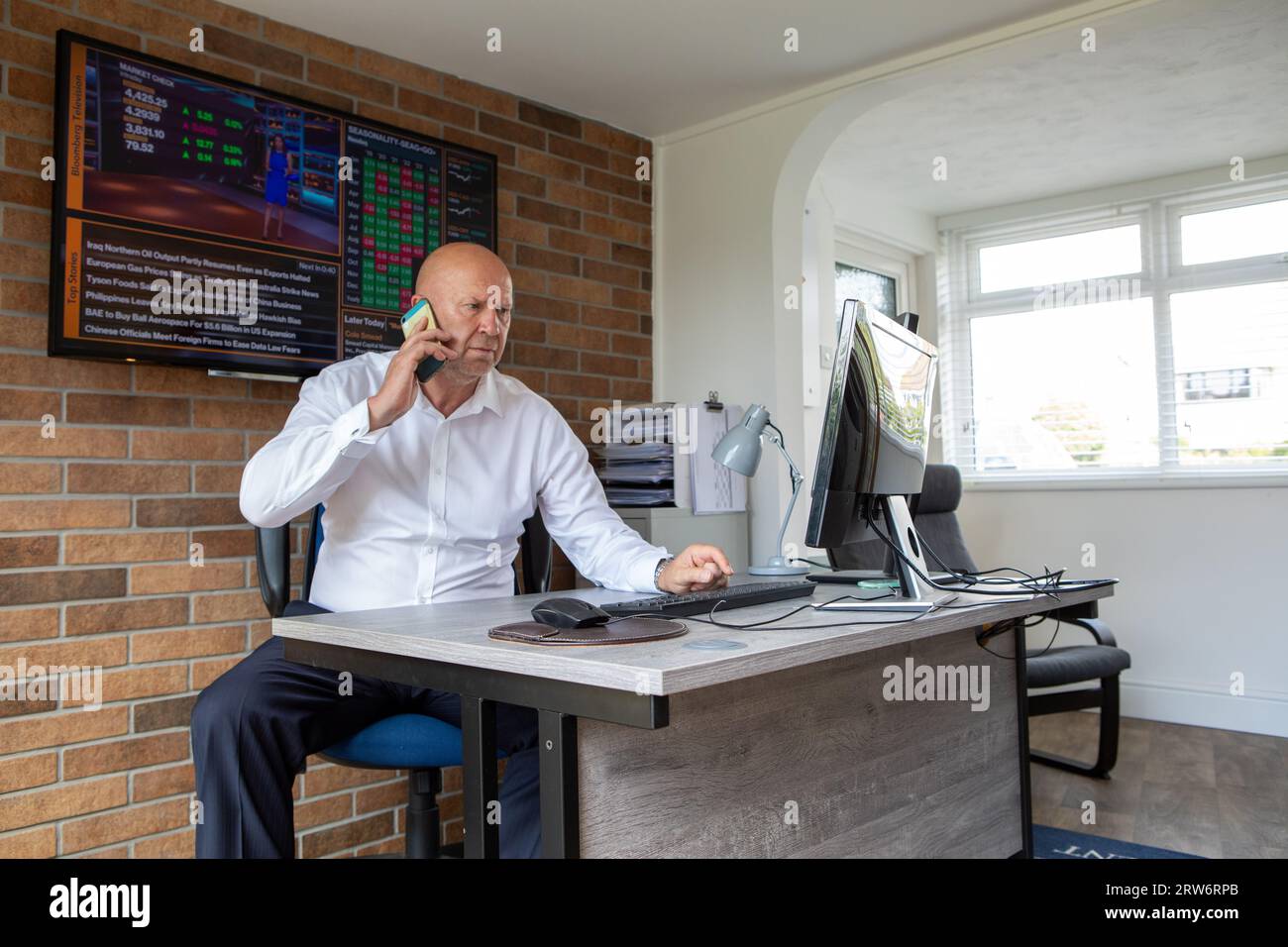 Businesman working from home Stock Photo