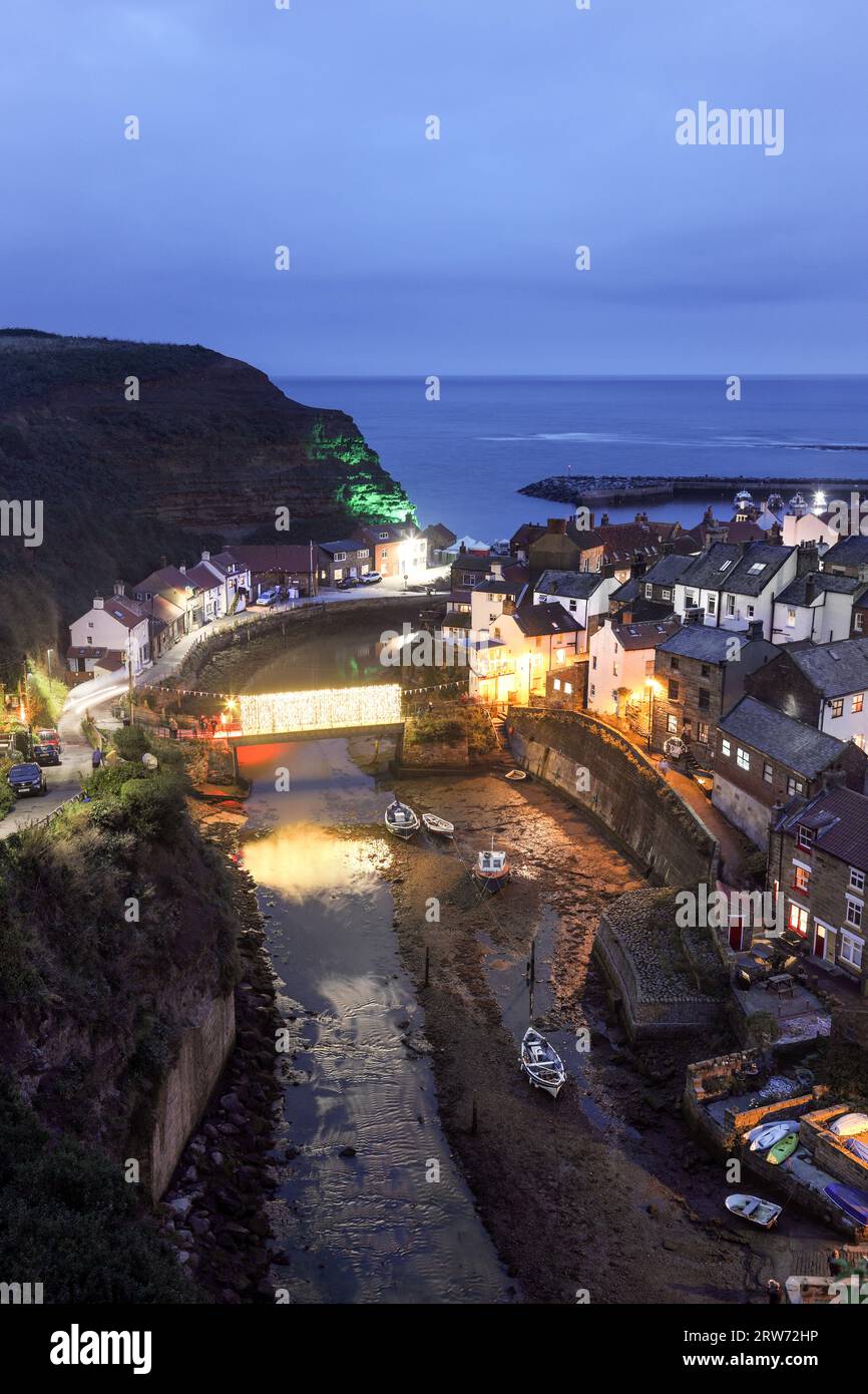 Staithes Village at Dusk During the Staithes Festival of Arts and Heritage, North Yorkshire, UK Stock Photo