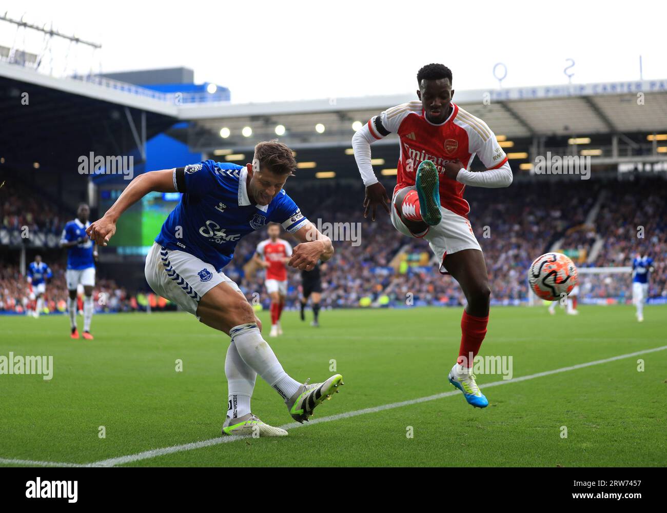 Everton's James Tarkowski (left) and Arsenal's Eddie Nketiah battle for the ball during the Premier League match at Goodison Park, Liverpool. Picture date: Sunday September 17, 2023. Stock Photo