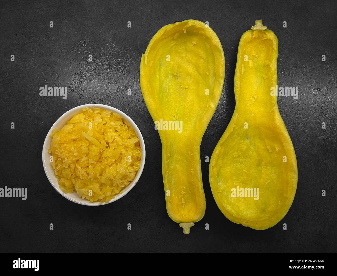 Stuffed zucchini recipe. Zucchini cut and emptied of its pulp, put in a bowl Stock Photo Alamy