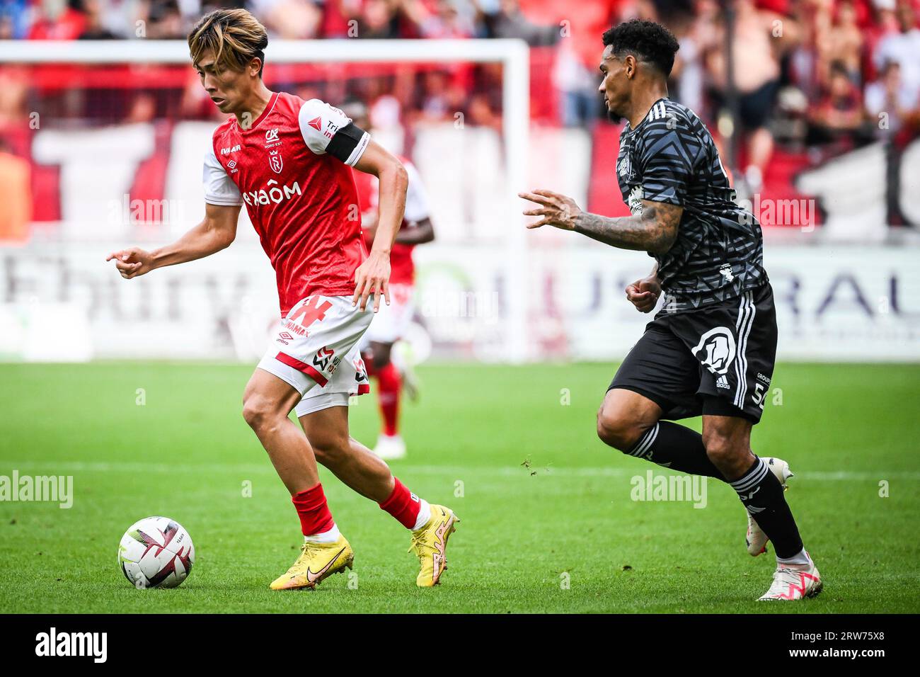 Keito NAKAMURA of Reims and Kenny LALA of Brest during the French  championship Ligue 1 football match between Stade De Reims and Stade  Brestois on September 17, 2023 at Auguste Delaune stadium