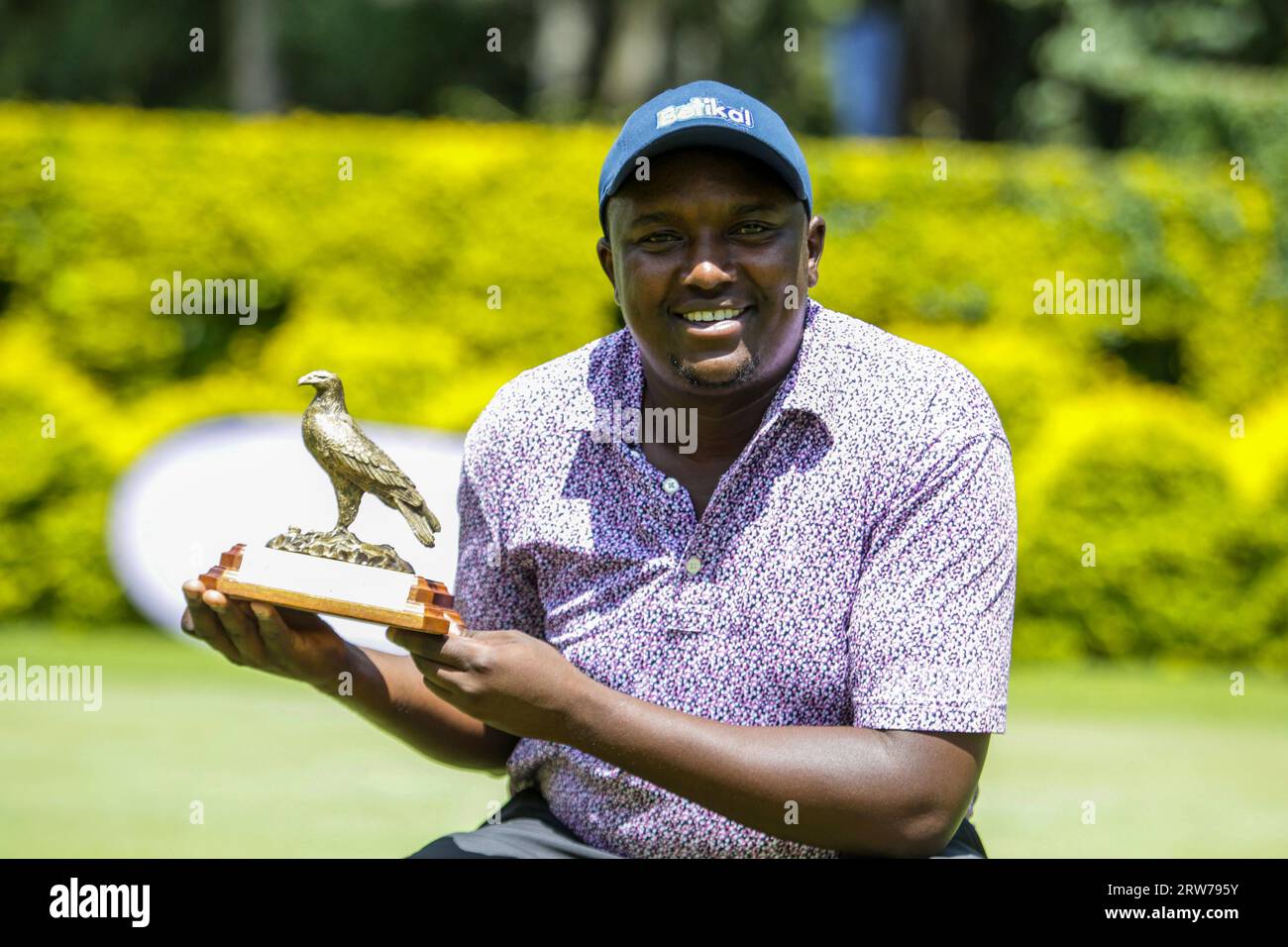 NAIROBI, KENYA - SEPTEMBER 17 Micheal Karanga of Kiambu Golf Club display`s Kenya Amateur strokeplay championship, Kabete Open Trophy on September 17 Stock Photo pic