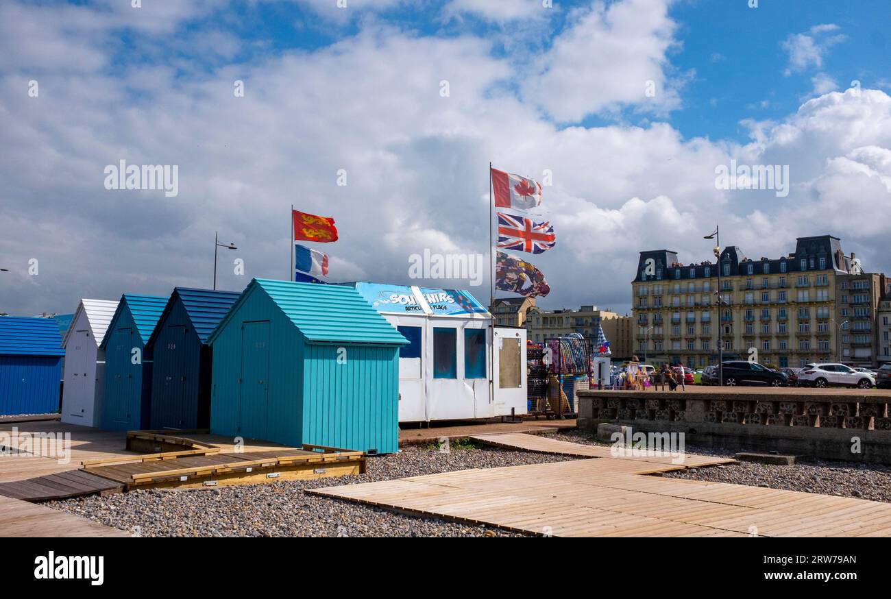 Beach huts and gift shops on Dieppe seafront , Normandy  Dieppe is a fishing port on the Normandy coast of northern France    Credit Simon Dack Stock Photo