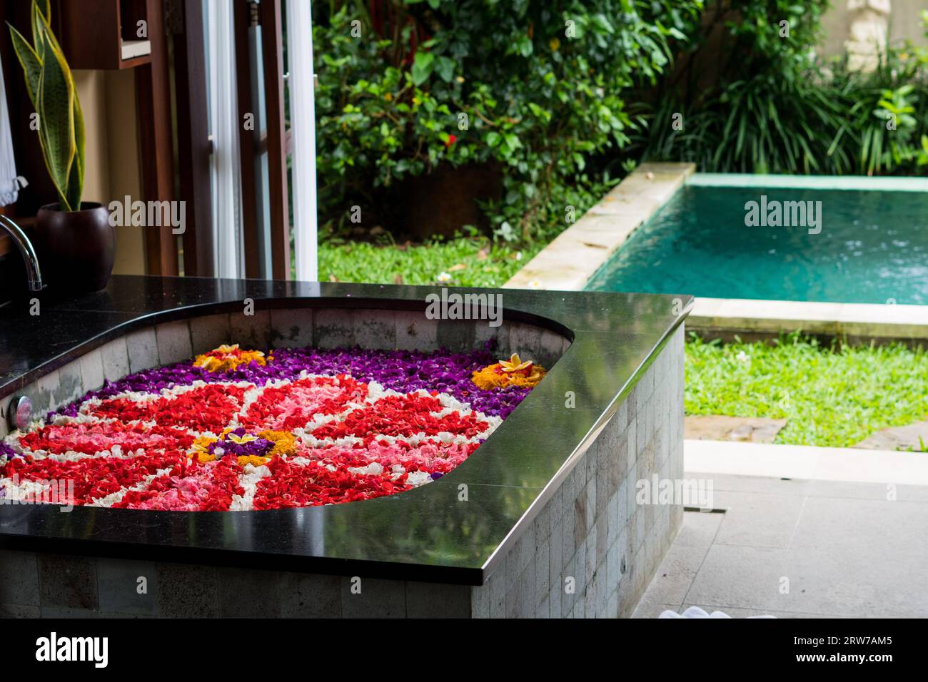 Flower bath bathroom with views to private swimming pool in Ubud Bali