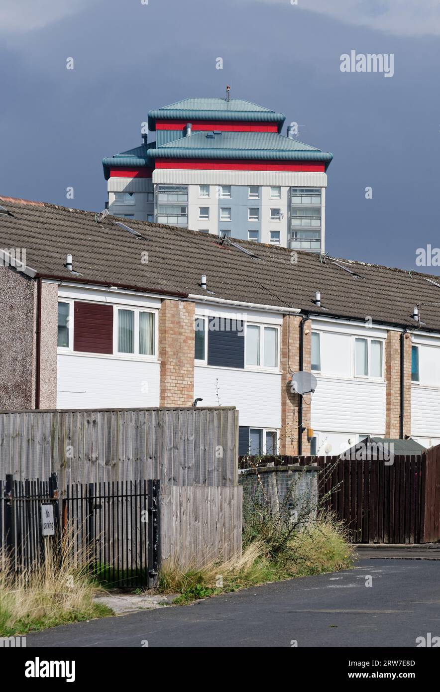 High rise council flat and houses in poor housing estate  Stock Photo