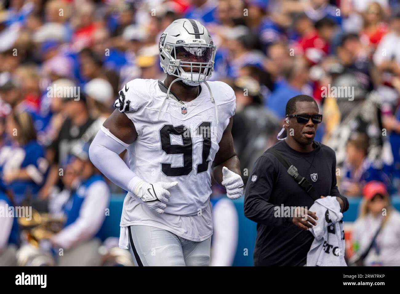 Las Vegas Raiders defensive tackle Bilal Nichols (91) jogs off the field  during an NFL football game, Sunday, Sept. 17, 2023, in Orchard Park, NY.  (AP Photo/Matt Durisko Stock Photo - Alamy