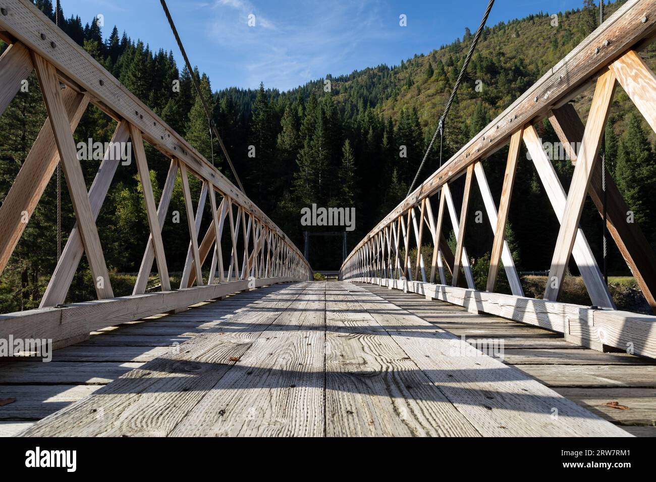A pack bridge spans the Lochsa River at the Split Creek Trailhead in the Nez Perce-Clearwater National Forest, Idaho. Stock Photo