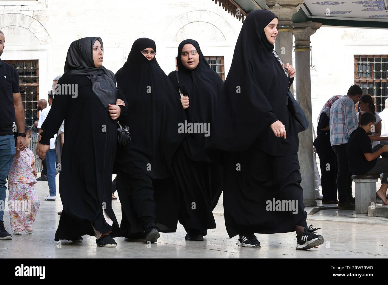 Muslim women, each wearing a burqa, in Istanbul Turkey Stock Photo