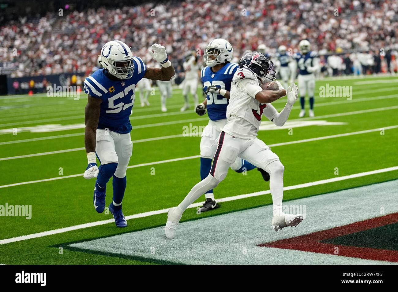 Houston Texans wide receiver Tank Dell runs after a catch against