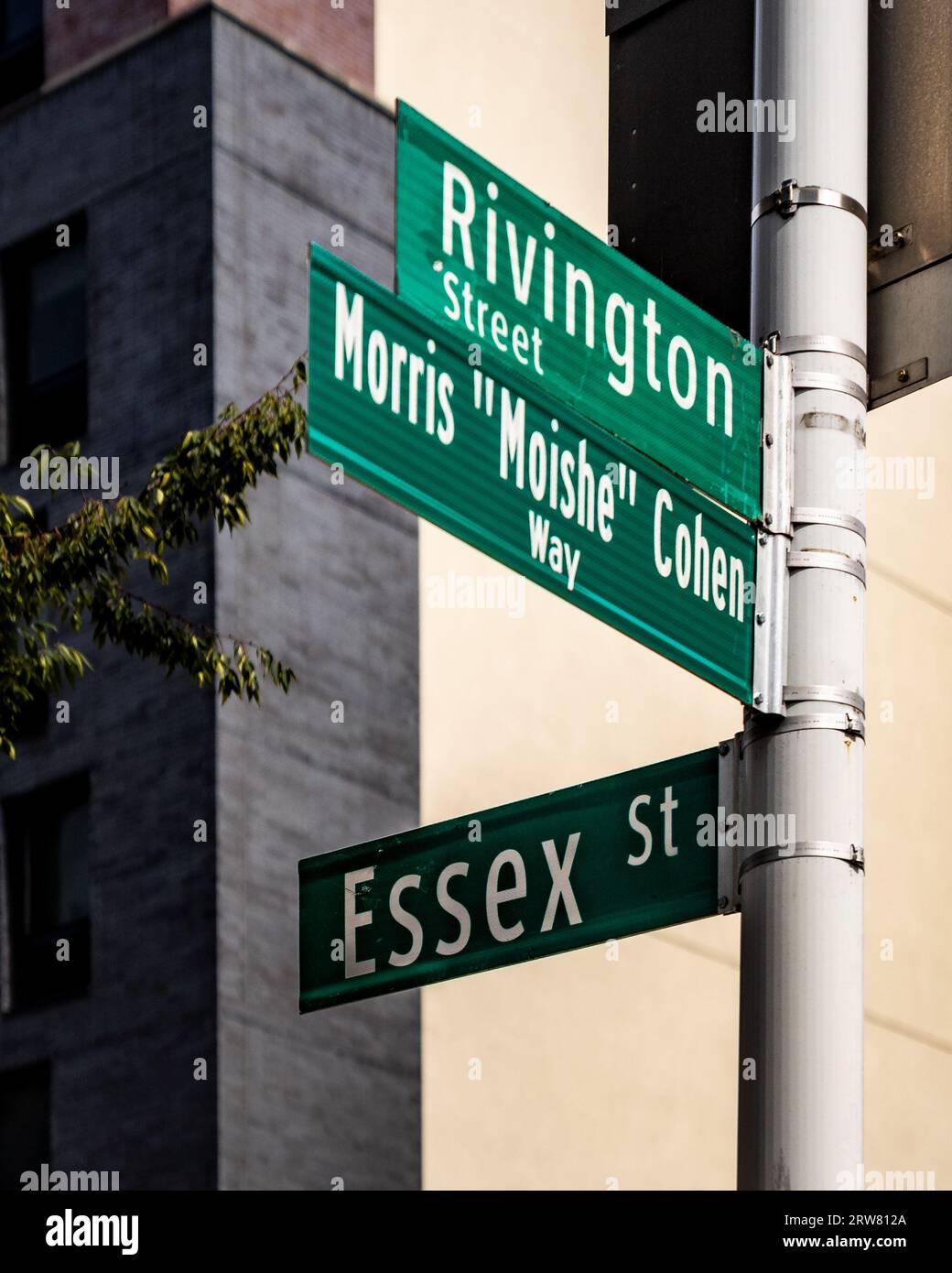 New York, NY - US - Sept 16, 2023 Rivington Street, Morris “Moishe” Cohen Way and Essex Street street signs in Lower East Side neighborhood of Manhatt Stock Photo