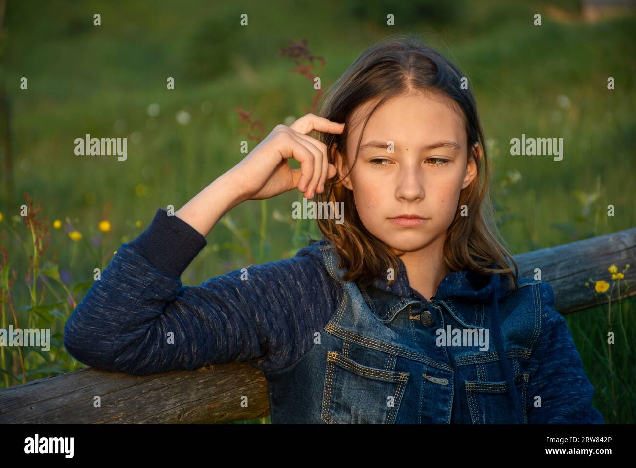 close-up portrait of a thinking teenage girl Stock Photo