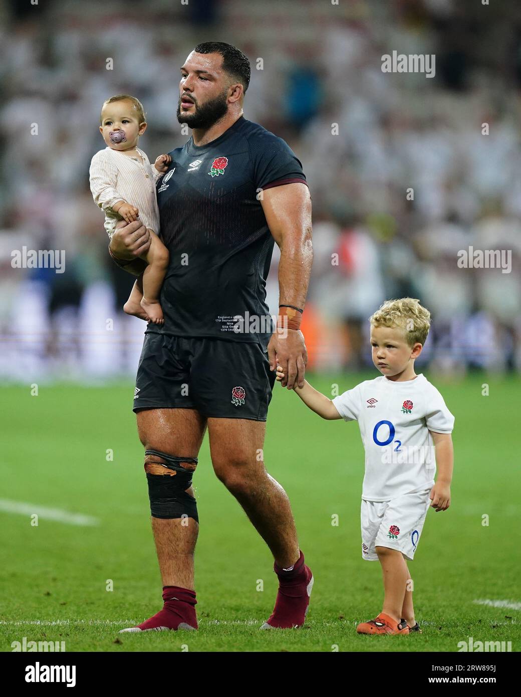 England's Ellis Genge seen with his two children following the Rugby World Cup 2023, Pool D match at the Stade De Nice, France. Picture date: Sunday September 17, 2023. Stock Photo