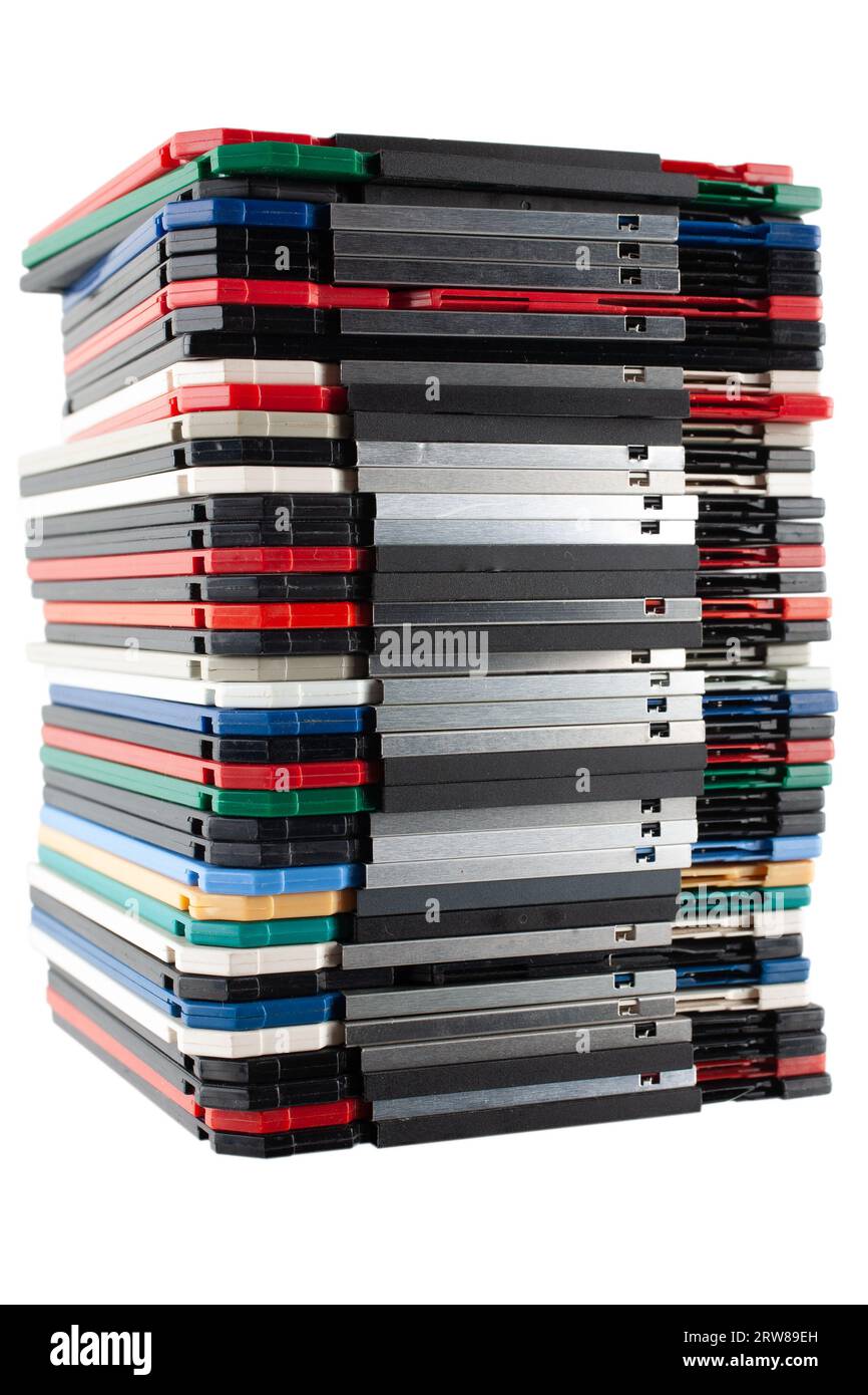 Colored old retro floppy diskettes in stack. Isolated on white background. Stock Photo